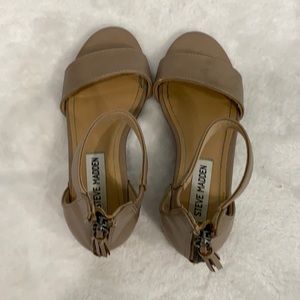 These are baige Steve Madden heeled-dress shoes